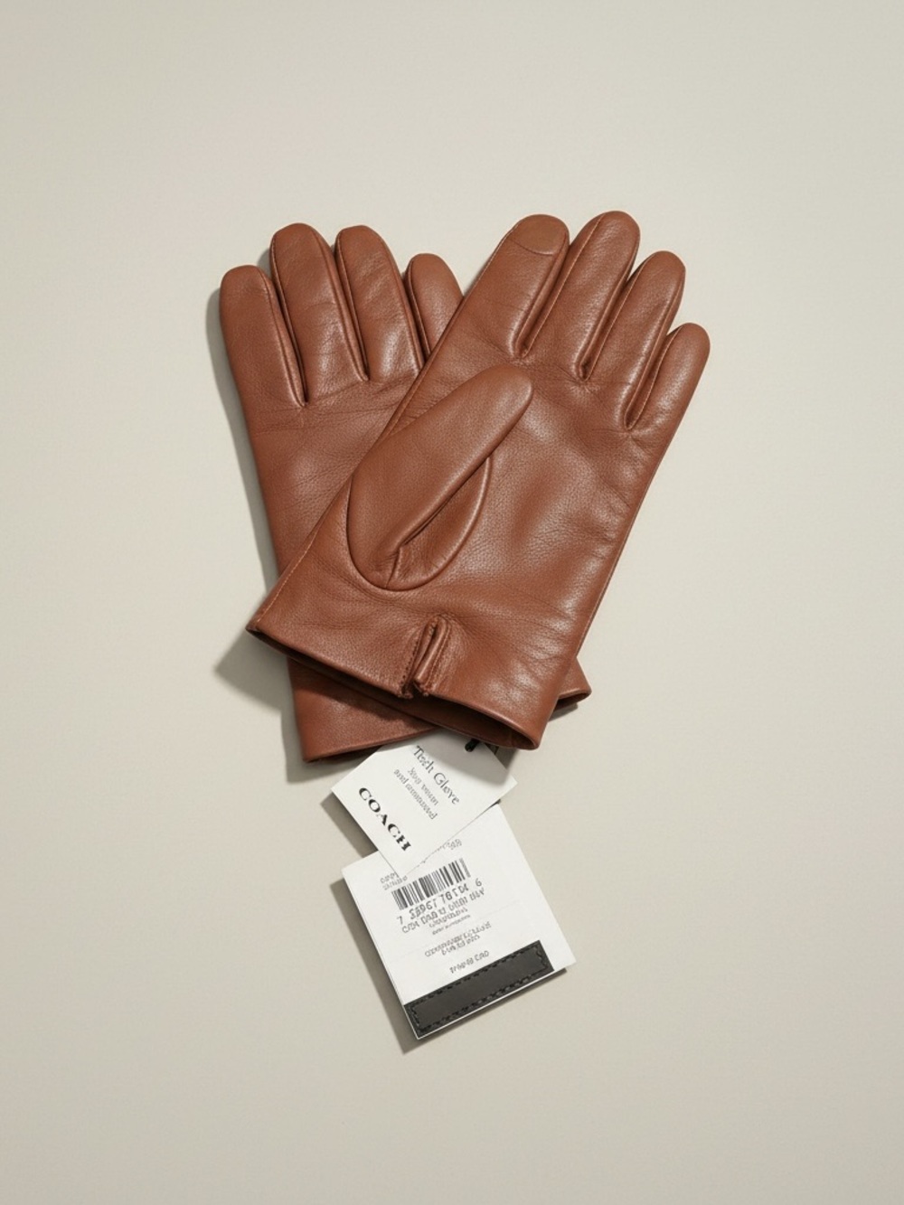 Women’s brown Coach leather gloves